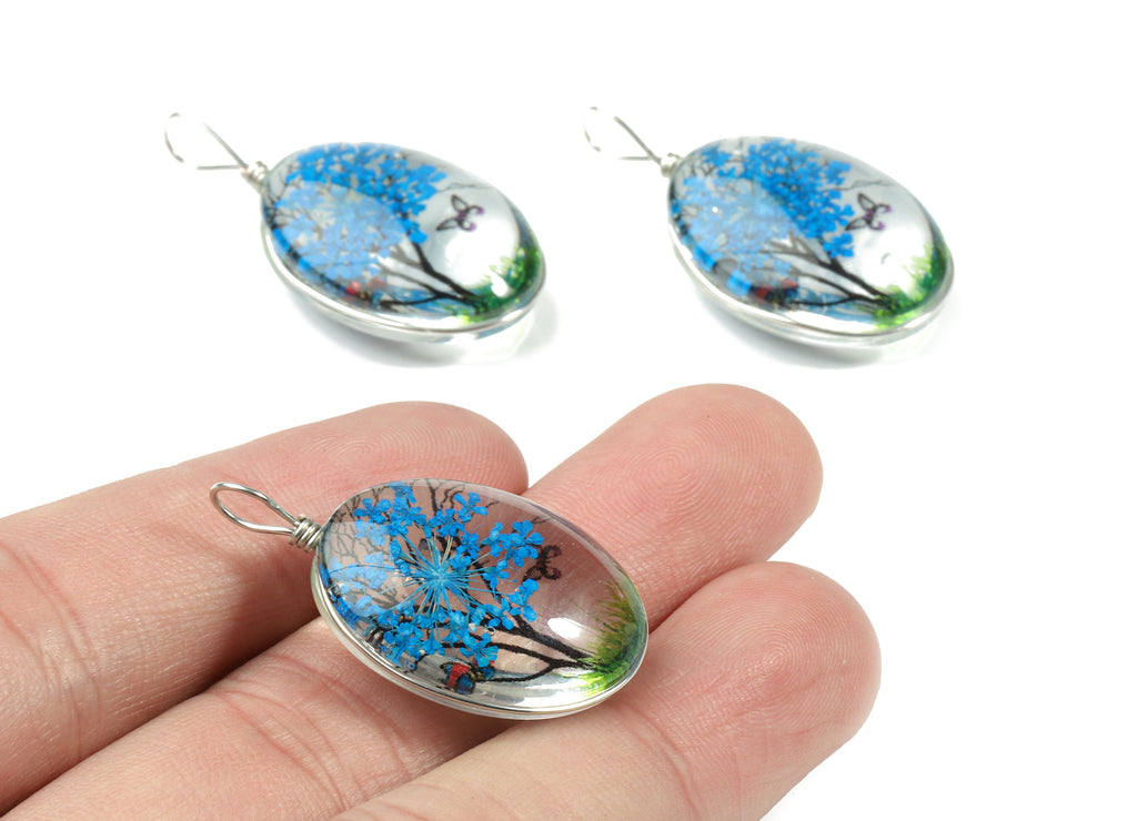 Real Flower Tree Pendant - Pressed Blue Flower in Oval Glass - Handmade Pressed Natural Flower Jewelry - 36.74x18.55x10.53mm - GS1034B - DOMEDBAZAAR